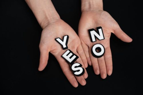 person with letters on his palms